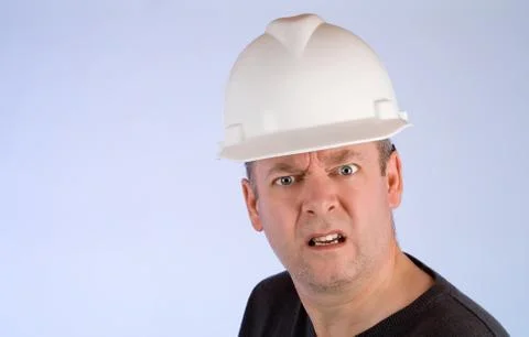 Grumpy construction worker Stock Photos