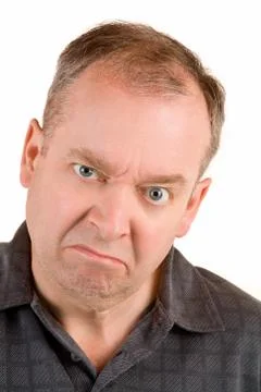 Grumpy middle aged man Stock Photos