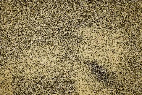 Grunge abstract scattered dotted image on a yellow background. Ilustração Stock
