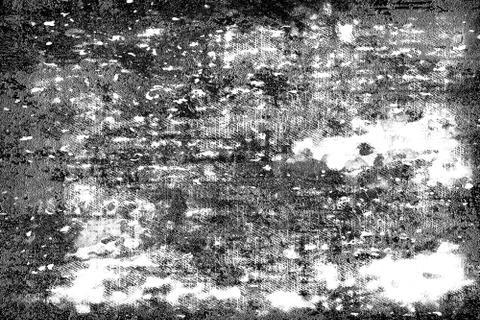 Grunge background black and white. Dark abstract texture. Pattern of spots, c Фото