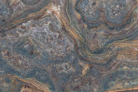Grunge background: curly rust on an old metal surface, toning Stock Photos