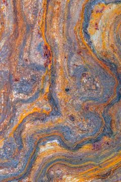 Grunge background: curly rust on an old metal surface, toning Foto stock