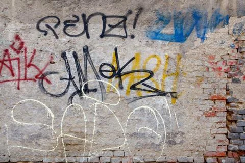 Grunge background with graffiti elements Stock Photos