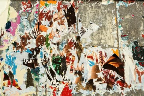 Grunge background with old torn posters Stock Photos