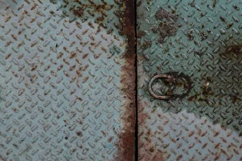 Grunge dirty metal diamond plate sheet with water background. Stock Photos