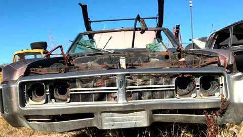 Grunge footage. Outdated car. Scrap cars background. 스톡 동영상 257653404