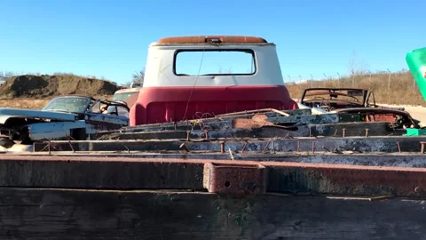Grunge footage. Outdated car. Scrap cars background. 스톡 동영상 257653451