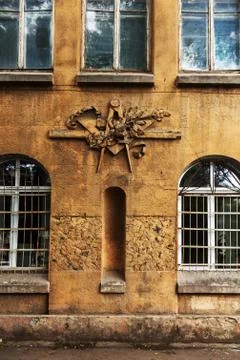 Grunge freemasonry emblem on a dramatic background - masonic triangle and com Stock Photos