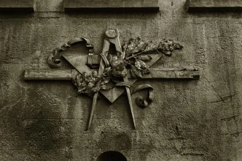 Grunge freemasonry emblem on a dramatic background - masonic triangle and com Stock Photos