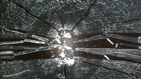 Grunge Glass breaking in slow motion on black background Stock Footage 126225235