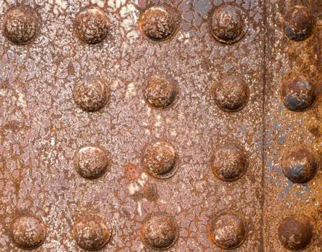 Grunge iron surface riveted background texture Stock Photos