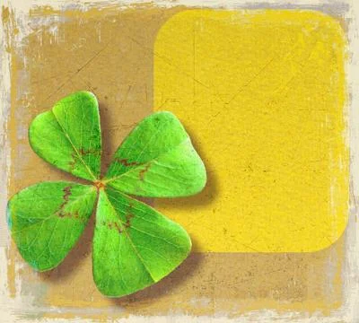 Grunge paper background with four-leaf clover and space for text Stock Illustration