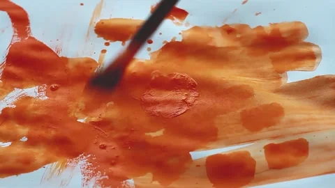 Grunge pattern. Abstractionism in modern style. Orange paint on white sheet. Stockbeeldmateriaal 220669739