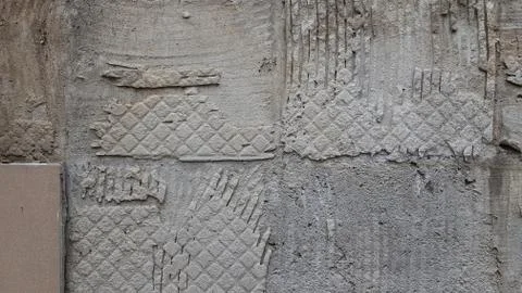 Grunge patterned textures of rough wall under renovation works Stock Photos