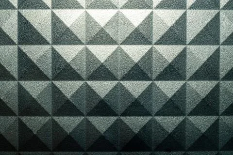 Grunge pyramid pattern background with light Stock Photos