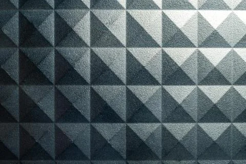 Grunge pyramid pattern background with light Foto stock