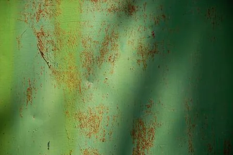 Grunge texture. Green rusty fence. Stock Photos