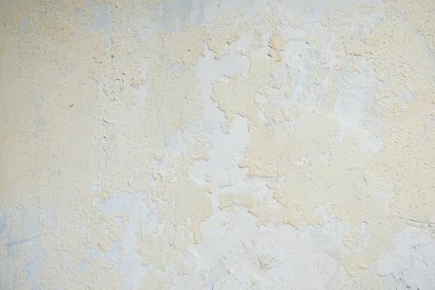 Grunge texture of peeling paint on old wall surface Stock Photos
