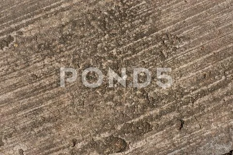 Grunge textured concrete sidewalk background Stock Photos