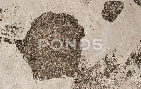 Grunge textured concrete sidewalk with big crack Stock Photos