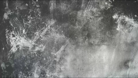 Grunge textured wall dust and scratches slowly drifting across dark industr.. Stockbeeldmateriaal 339791272