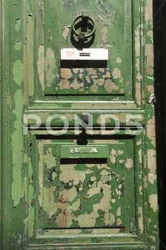 Grungy green door Stock Photos