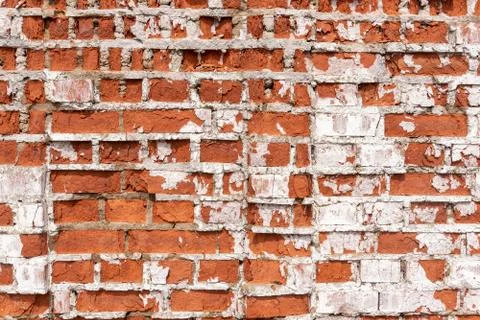 Grungy old empty red brick wall, rusty building Stock Photos
