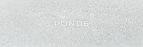 Grungy white washed painted wall texture as background. Cracked concrete vint Stock Photos