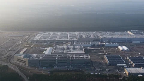 Grunheide, Oder Spree District, Germany, December, 13, 2025: Tesla Gigafactory Stock Footage 325053462