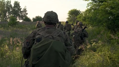 Grunts moving out in line formation Stock-Footage 251631424