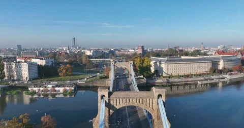 Grunwald Bridge flyover toward Wrocław skyline on an autumn morning Stock Footage 346659770
