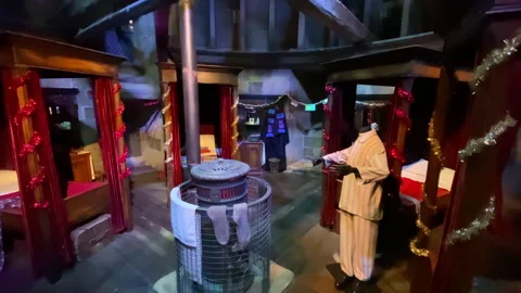 Gryffindor boys' dormitory set in the Harry Potter Studio Tour Stock Footage 323918453