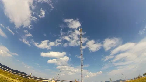 GSM Antenna on a blue sky background Stock Footage 87902820