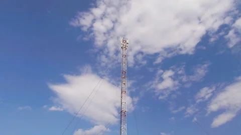 GSM Antenna on a blue sky background Stock Footage 88317289