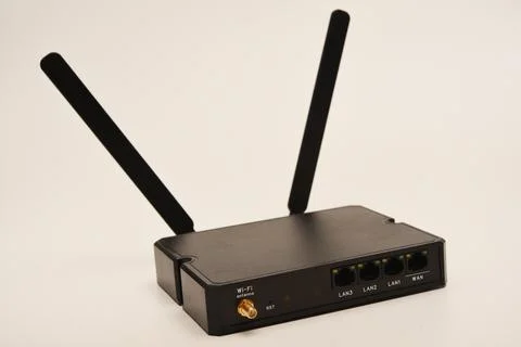 GSM modem. An Internet station with a SIM card. A black router on a white b.. Stock Photos