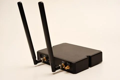 GSM modem. An Internet station with a SIM card. A black router on a white b.. Stock Photos