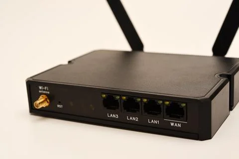 GSM modem. An Internet station with a SIM card. A black router on a white b.. Stock Photos