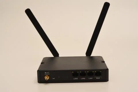 GSM modem. An Internet station with a SIM card. A black router on a white b.. Stock Photos