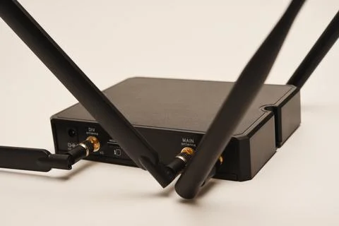 GSM modem. An Internet station with a SIM card. A black router on a white b.. Stock Photos