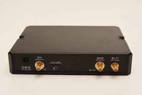 GSM modem. An Internet station with a SIM card. A black router on a white b.. Stock Photos