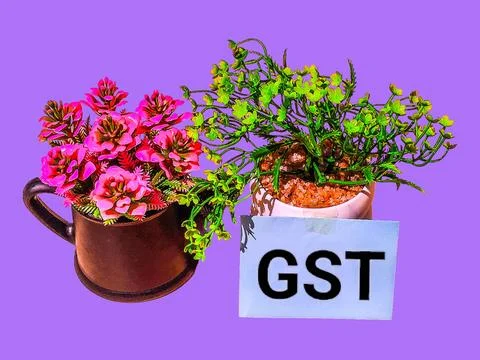 Gst concept with artificial trees and words Stock-Fotos