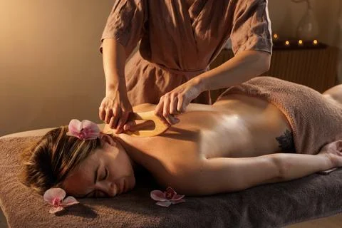 Gua Sha Wooden Scraper Back Massage Therapy for Deep Tissue Relief and Holi.. Stock Photos