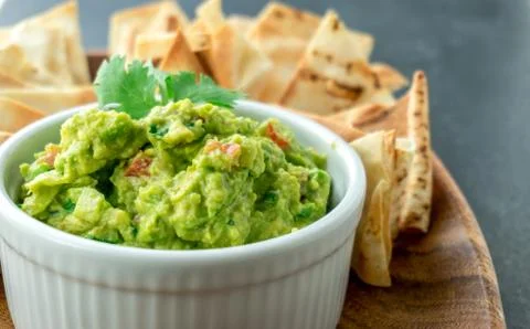 Guacamole close-up view. Stock Photos