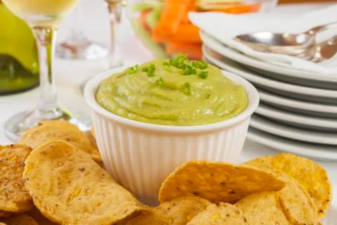 Guacamole with corn chips Stock Photos