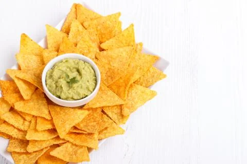 Guacamole with corn chips Stock Photos