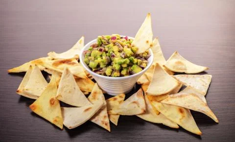 Guacamole with corn chips Stock Photos