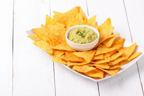 Guacamole with corn chips Stock Photos
