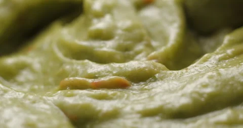 Guacamole preparing close up slowmotion Stock Footage 280520413