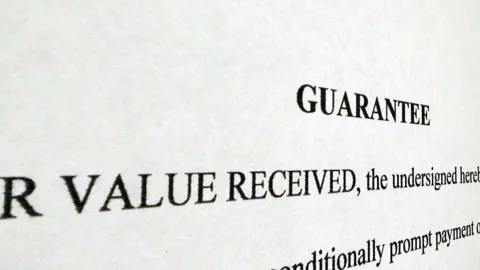 Guarantee Document Close-Up with Legal Contract Text Stock Footage 334893959