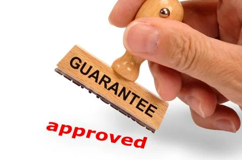 Guarantee printed on rubber stamp Stock Photos